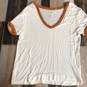 white and burnt orange t-shirt